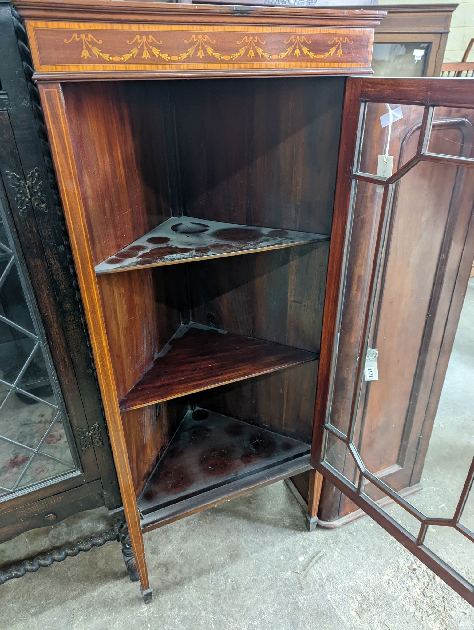 An Edwardian inlaid mahogany standing corner cabinet, width 62cm, depth 41cm, height 145cm
